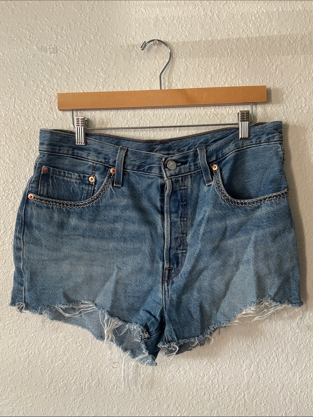 Levi's Distressed Light Blue High-Rise Denim Shorts